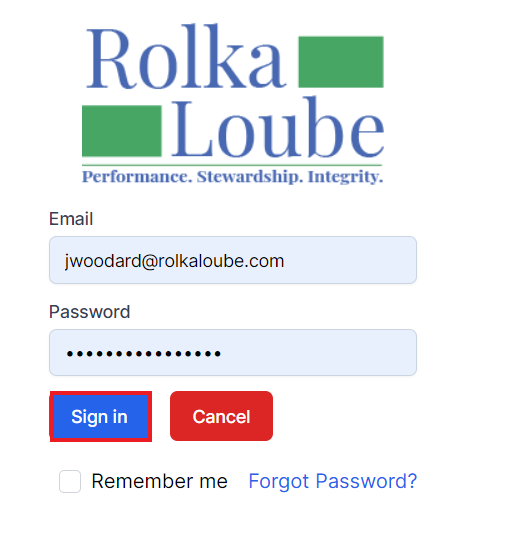 Rolka Loube logo with email field filled in and password field filled in below that.  On the right the sign in button is highlighted by a red box. on the right is a cancel button.  Below the Sign in button is a remember me checkbox.  On the right is Forgot Password in blue